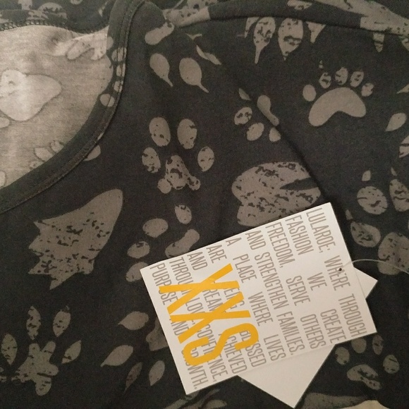 LuLaRoe Tops - BNWT Lularoe Irma tunic xxs paw prints so cute!